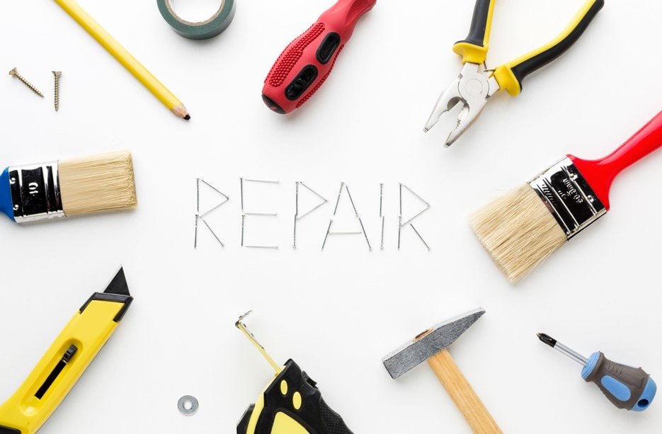 repair word written with nails repair utensils